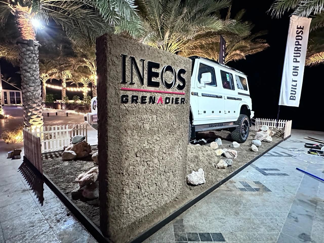 INEOS Grenadier scenic display with textured fabrication and evening lighting