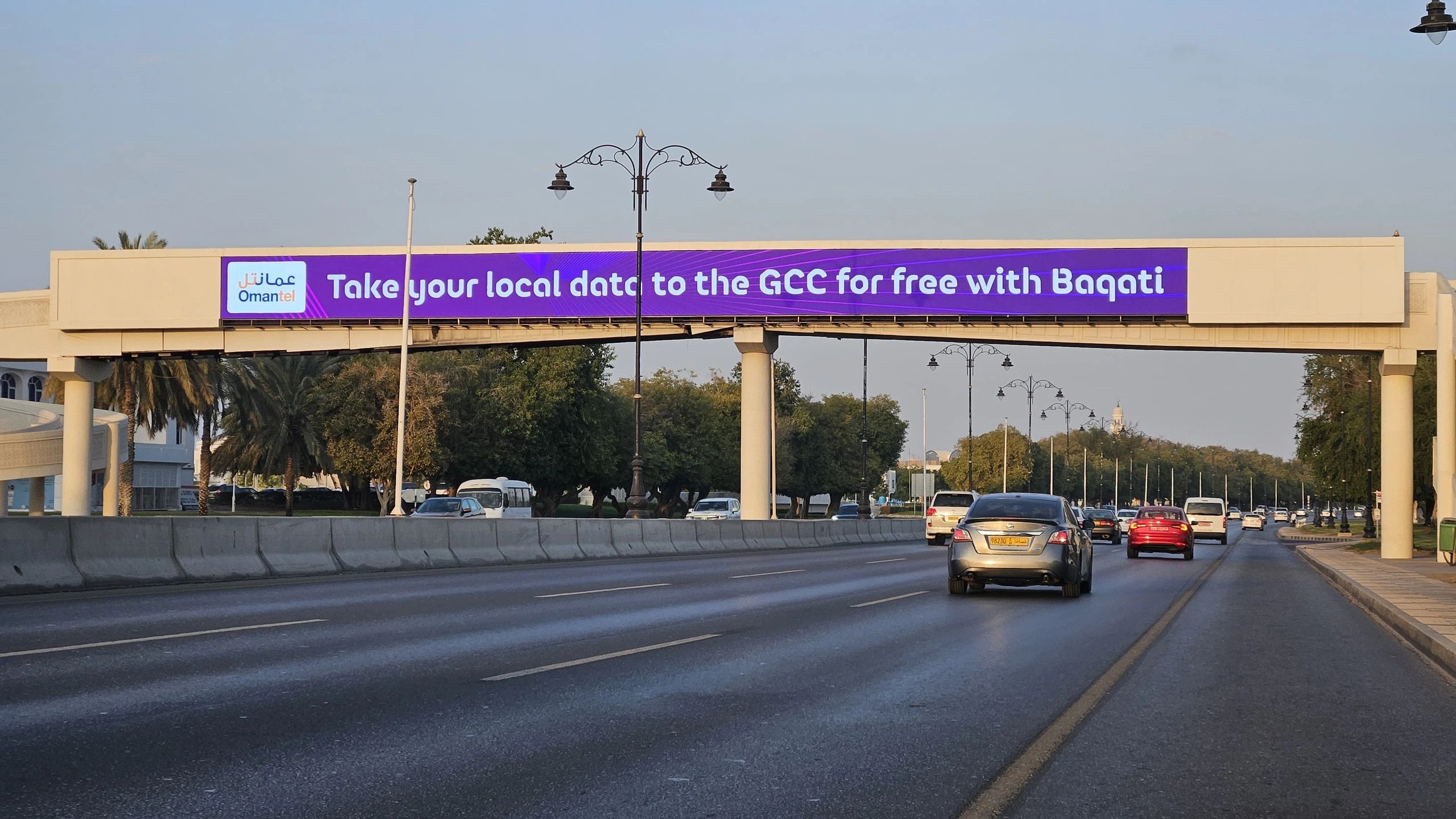 Outdoor advertising across a roadway