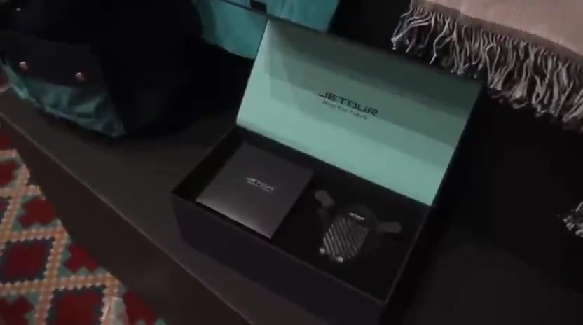 A presentation gift box displayed at a corporate evening.